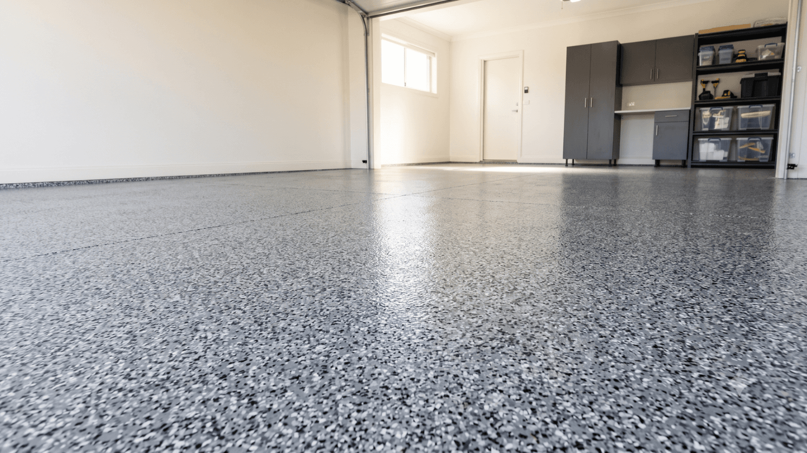 Residential garage with a finished epoxy floor coating
